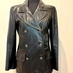 CHANEL: black leather double breasted jacket
